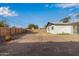 Spacious backyard with wooden fence at 2033 W Sunnyside Ave, Phoenix, AZ 85029