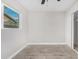 Light and airy bedroom with wood-look floors and a window at 2033 W Sunnyside Ave, Phoenix, AZ 85029