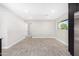 Bright dining area with wood-look tile floors and access to kitchen at 2033 W Sunnyside Ave, Phoenix, AZ 85029
