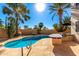 Inviting pool and patio area, complete with a built-in BBQ at 13451 N 93Rd Way, Scottsdale, AZ 85260