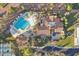 Aerial view of community pool, clubhouse, and tennis courts at 22838 N De La Guerra Dr, Sun City West, AZ 85375