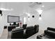 Home theater with comfortable seating and large projection screen at 11475 E Paradise Ln, Scottsdale, AZ 85255