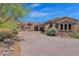 Elegant home with stone accents and a grand entrance at 11475 E Paradise Ln, Scottsdale, AZ 85255