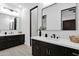 Spacious bathroom with double vanity and dark wood cabinets at 11475 E Paradise Ln, Scottsdale, AZ 85255