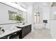 Elegant bathroom with double vanity, soaking tub, and walk-in shower at 11475 E Paradise Ln, Scottsdale, AZ 85255