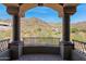 Covered balcony offering scenic mountain views at 11475 E Paradise Ln, Scottsdale, AZ 85255