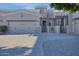 Front view of a charming two-story home with a well-manicured lawn and attractive landscaping at 6202 E Mckellips Rd # 154, Mesa, AZ 85215