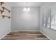 Bright dining area with wood floors and large window at 3704 W Vivian Ct, Phoenix, AZ 85086