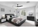 Main bedroom with ceiling fan and gray bedding at 3704 W Vivian Ct, Phoenix, AZ 85086