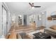 Open living area with staircase and views to the kitchen and office at 3704 W Vivian Ct, Phoenix, AZ 85086