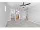 Bright bedroom with ceiling fan and en-suite bathroom at 3704 W Vivian Ct, Phoenix, AZ 85086