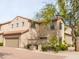 Two-story house with tan exterior and a garage at 3704 W Vivian Ct, Phoenix, AZ 85086