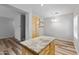 Kitchen island with granite countertop and light wood cabinets at 3704 W Vivian Ct, Phoenix, AZ 85086