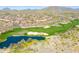 Aerial view of community golf course and residential area at 3704 W Vivian Ct, Phoenix, AZ 85086