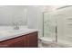 Bathroom with vanity, toilet and shower stall at 17065 W Molly Ln, Surprise, AZ 85387