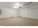 Spacious two-car garage with ample storage space at 17065 W Molly Ln, Surprise, AZ 85387