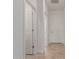 Clean and bright entryway with tile flooring and access to rooms at 17065 W Molly Ln, Surprise, AZ 85387