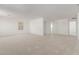 Bright bonus room featuring carpet and an open layout at 17065 W Molly Ln, Surprise, AZ 85387