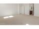 Spacious bedroom with ensuite bathroom access at 17065 W Molly Ln, Surprise, AZ 85387