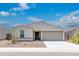 One-story home with two-car garage and desert landscaping at 18361 E Eloisa Dr, Gold Canyon, AZ 85118