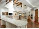 Spacious kitchen boasts a large island and high-end finishes at 5842 E Redwing Rd, Paradise Valley, AZ 85253