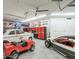 Spacious garage with car lift and ample storage at 5842 E Redwing Rd, Paradise Valley, AZ 85253