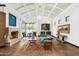 Spacious living room with hardwood floors, fireplace, and elegant decor at 5842 E Redwing Rd, Paradise Valley, AZ 85253