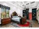 Elegant bedroom with dark wood furniture and red rug at 5842 E Redwing Rd, Paradise Valley, AZ 85253