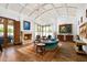 Bright living room with hardwood floors, fireplace, and comfortable seating at 5842 E Redwing Rd, Paradise Valley, AZ 85253