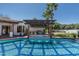 Resort-style pool and spa with outdoor kitchen and pergola at 5842 E Redwing Rd, Paradise Valley, AZ 85253