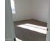 Bright bedroom with brown carpet and large window at 846 N Pueblo Dr # 137, Casa Grande, AZ 85122