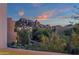 Scenic view of rock formations and homes from an elevated position at 10751 E Candlewood Dr, Scottsdale, AZ 85255