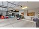Garage with overhead storage and ample space for cars and storage at 10751 E Candlewood Dr, Scottsdale, AZ 85255