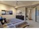Serene bedroom with a comfortable bed and calming decor at 10751 E Candlewood Dr, Scottsdale, AZ 85255