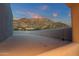 Elevated view of desert mountain landscape from a rooftop terrace at 10751 E Candlewood Dr, Scottsdale, AZ 85255