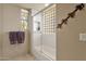 Clean bathroom with shower/tub combo and window at 10751 E Candlewood Dr, Scottsdale, AZ 85255