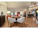Charming breakfast nook with a round table and four chairs, perfect for casual dining at 10751 E Candlewood Dr, Scottsdale, AZ 85255
