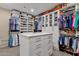 Spacious walk-in closet with ample shelving and hanging space at 10751 E Candlewood Dr, Scottsdale, AZ 85255