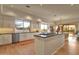 Spacious kitchen with island, breakfast bar, and outdoor access at 10751 E Candlewood Dr, Scottsdale, AZ 85255