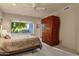 Bright bedroom with a comfortable bed and ample closet space at 10751 E Candlewood Dr, Scottsdale, AZ 85255