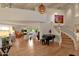 Elegant living room with hardwood floors, high ceilings, and a grand staircase at 10751 E Candlewood Dr, Scottsdale, AZ 85255
