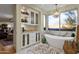 Luxurious bathroom with freestanding tub, marble floors, and custom cabinets at 10751 E Candlewood Dr, Scottsdale, AZ 85255