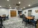 Game room with tables and chairs for card games at 10330 W Thunderbird Blvd # C115, Sun City, AZ 85351