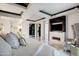 Luxurious bedroom with fireplace and large bed at 7157 E Rancho Vista Dr # 3006, Scottsdale, AZ 85251