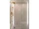 Spa-like shower with marble walls and gold fixtures at 7157 E Rancho Vista Dr # 3006, Scottsdale, AZ 85251