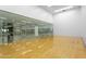 Indoor racquetball court with glass walls and hardwood floor at 7157 E Rancho Vista Dr # 3006, Scottsdale, AZ 85251