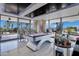 Game room with pool table, bar area and panoramic windows at 7157 E Rancho Vista Dr # 3006, Scottsdale, AZ 85251