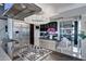 Modern kitchen with stainless steel appliances and a large island at 7157 E Rancho Vista Dr # 3006, Scottsdale, AZ 85251