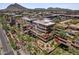Complex of modern buildings with mountain views and green spaces at 7157 E Rancho Vista Dr # 3006, Scottsdale, AZ 85251