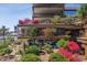 Landscaped courtyard with water feature and seating areas at 7157 E Rancho Vista Dr # 3006, Scottsdale, AZ 85251